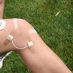 The flex loop conforms to hard to fit areas like knees.    Simple tape can hold the device in place.
